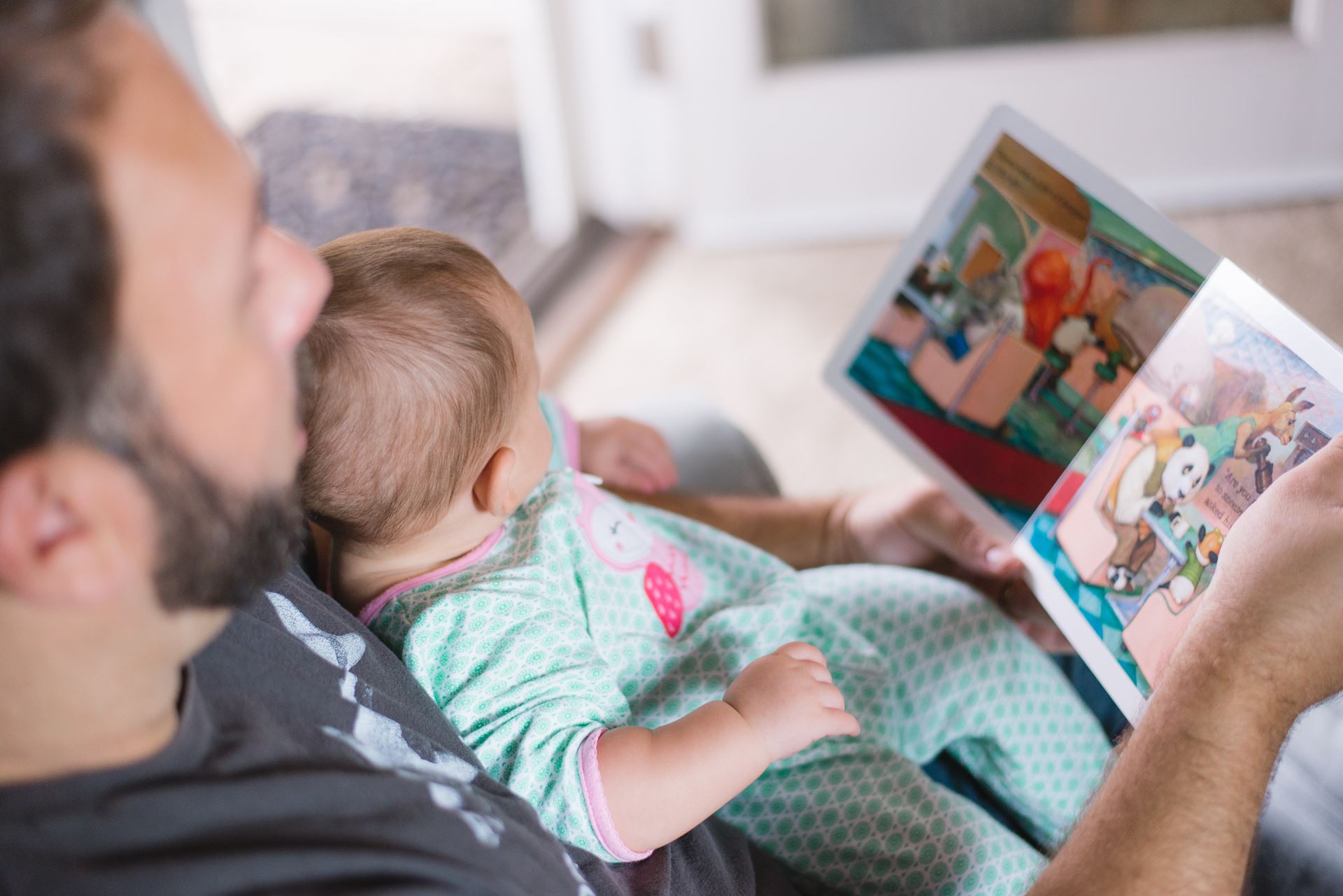 Dad and child reading